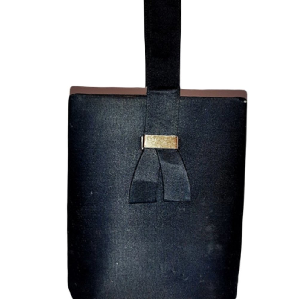 Vintage 1950s Tall And Slim Black Fabric Handbag With A Top Handle And A Bow